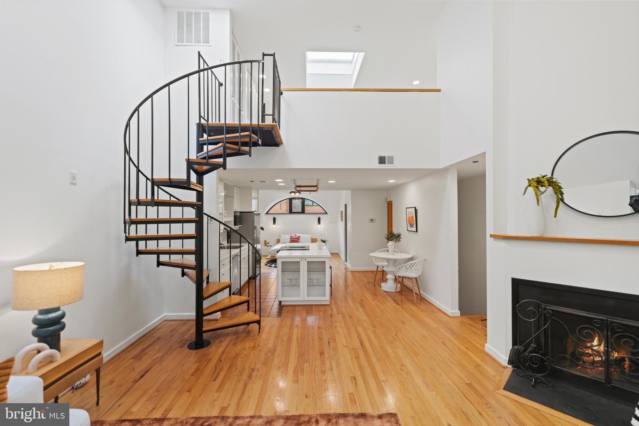 3517 17th Street Northwest, Unit 10 Washington, DC 20010 - Photo 25 of 35 a view of a livingroom with furniture and a fireplace