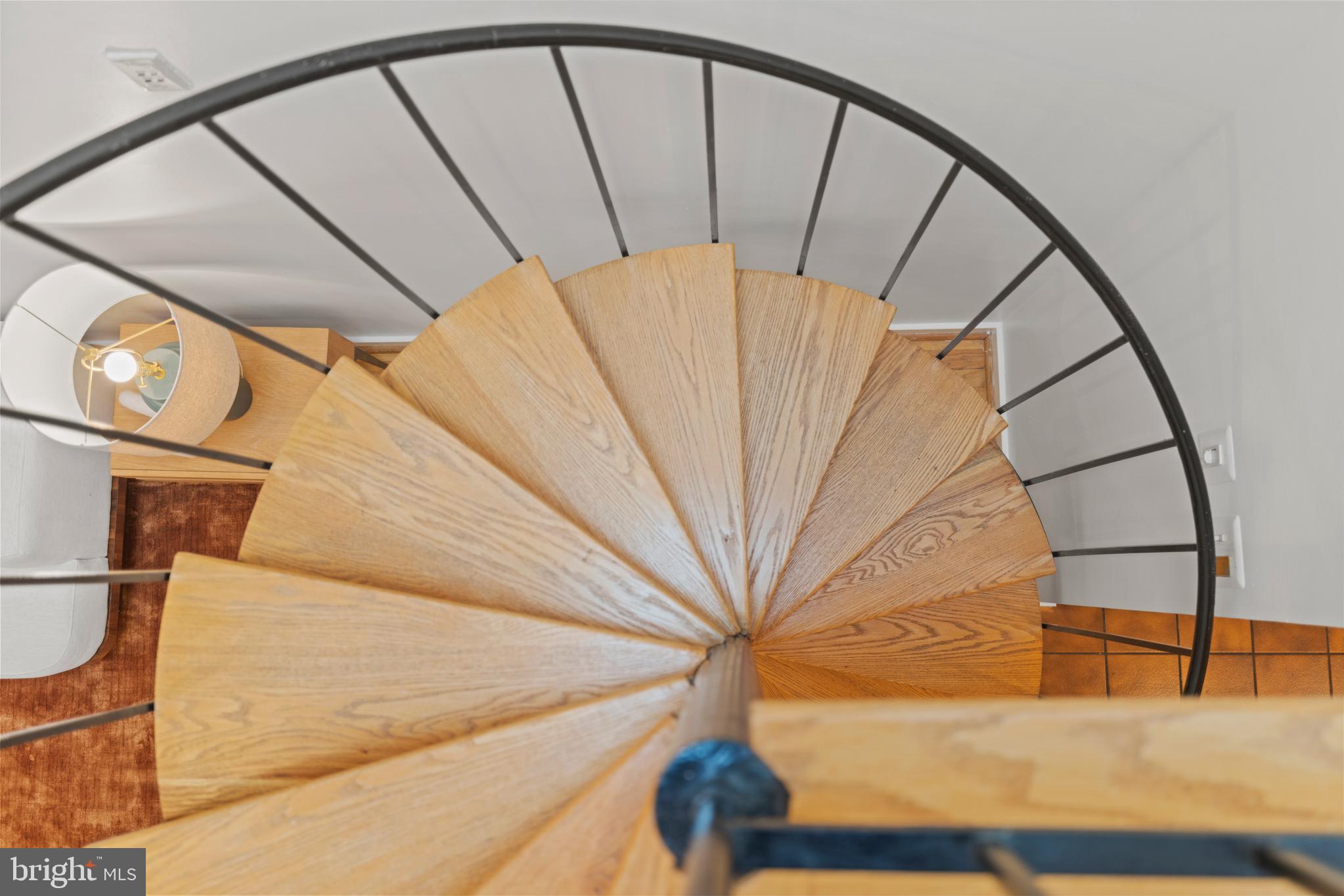 3517 17th Street Northwest, Unit 10 Washington, DC 20010 - Photo 26 of 35 a view of staircase with railing and white walls