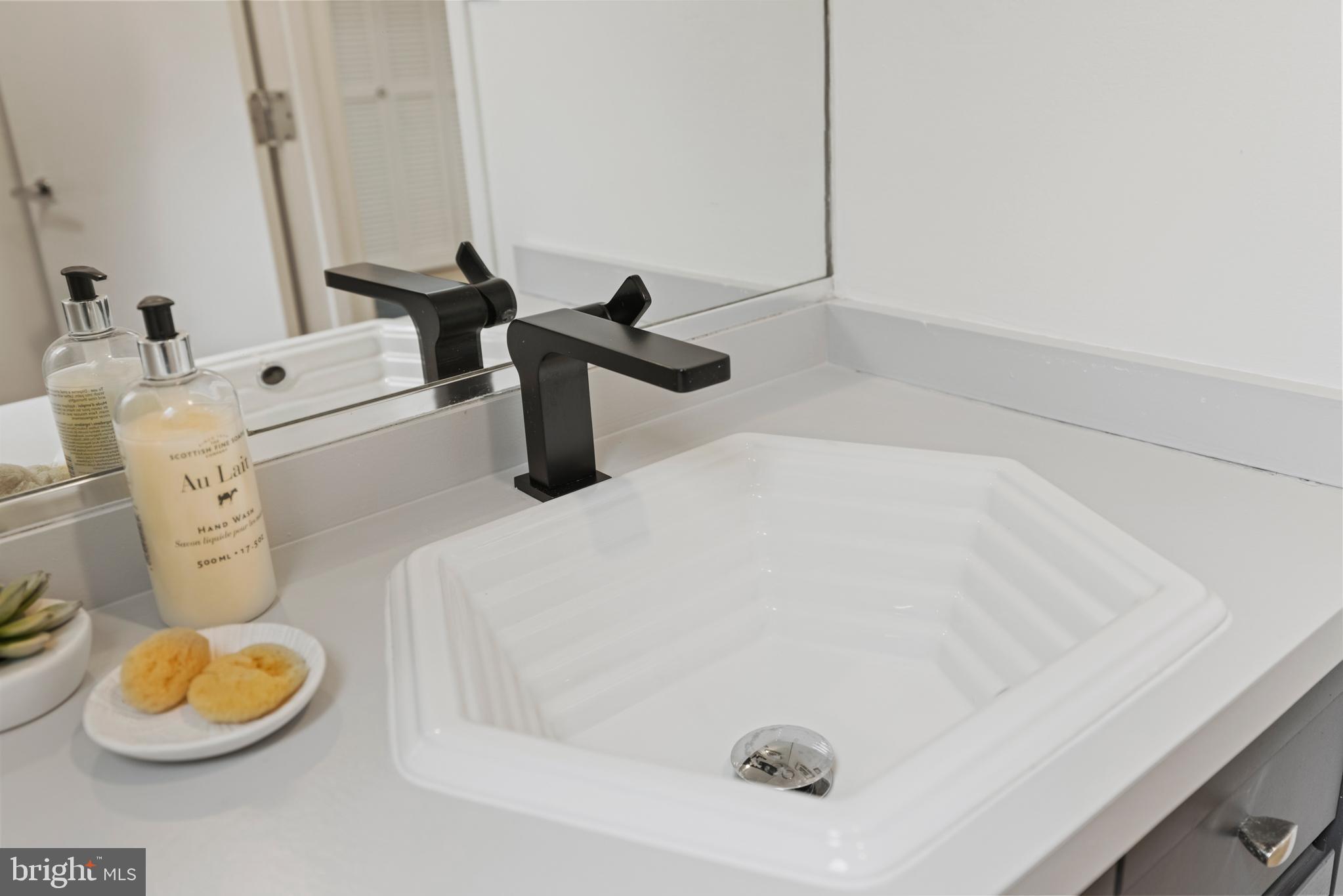 3517 17th Street Northwest, Unit 10 Washington, DC 20010 - Photo 30 of 35 a bathroom with a sink and a toilet