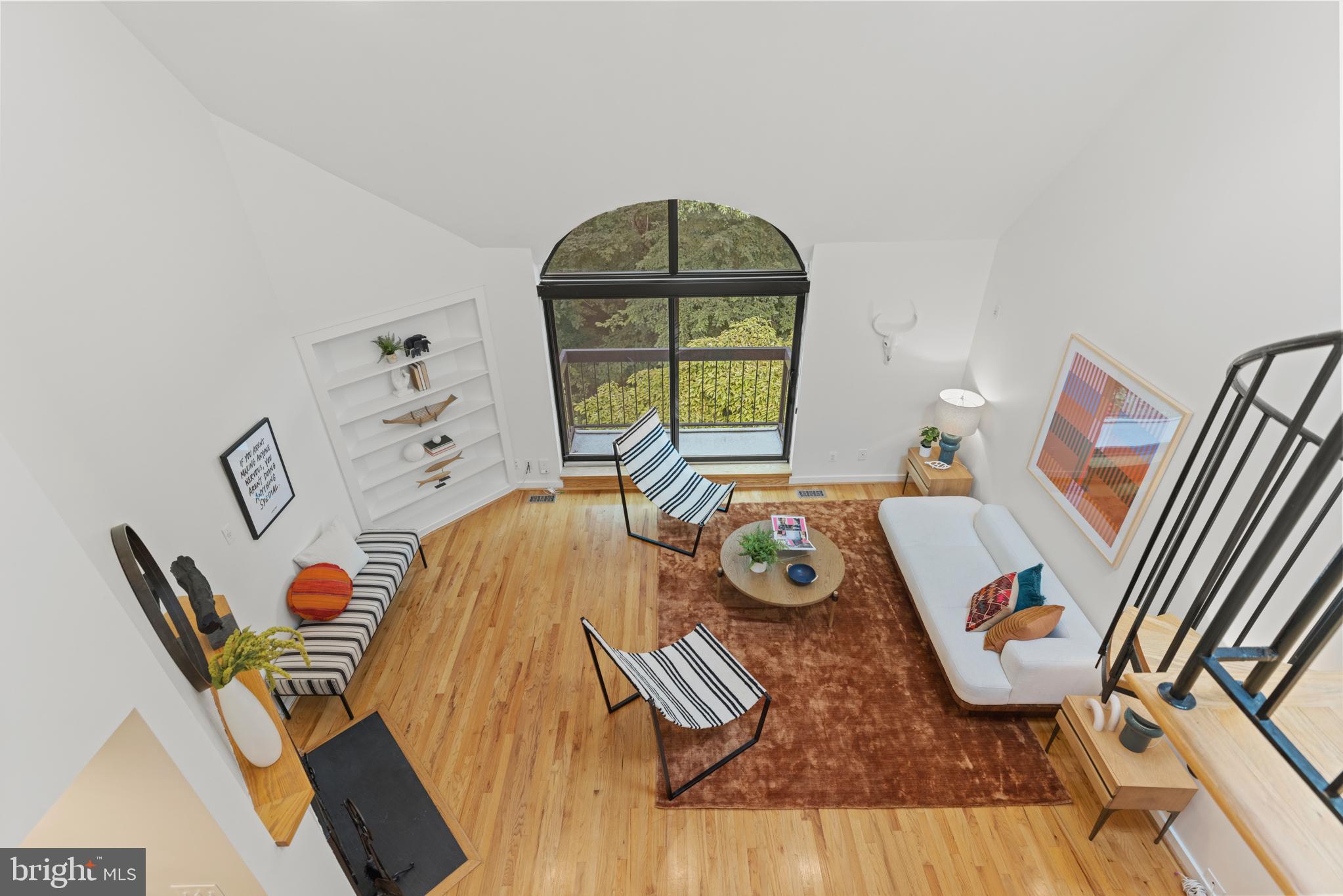 3517 17th Street Northwest, Unit 10 Washington, DC 20010 - Photo 32 of 35 wooden floor with table and chairs in it