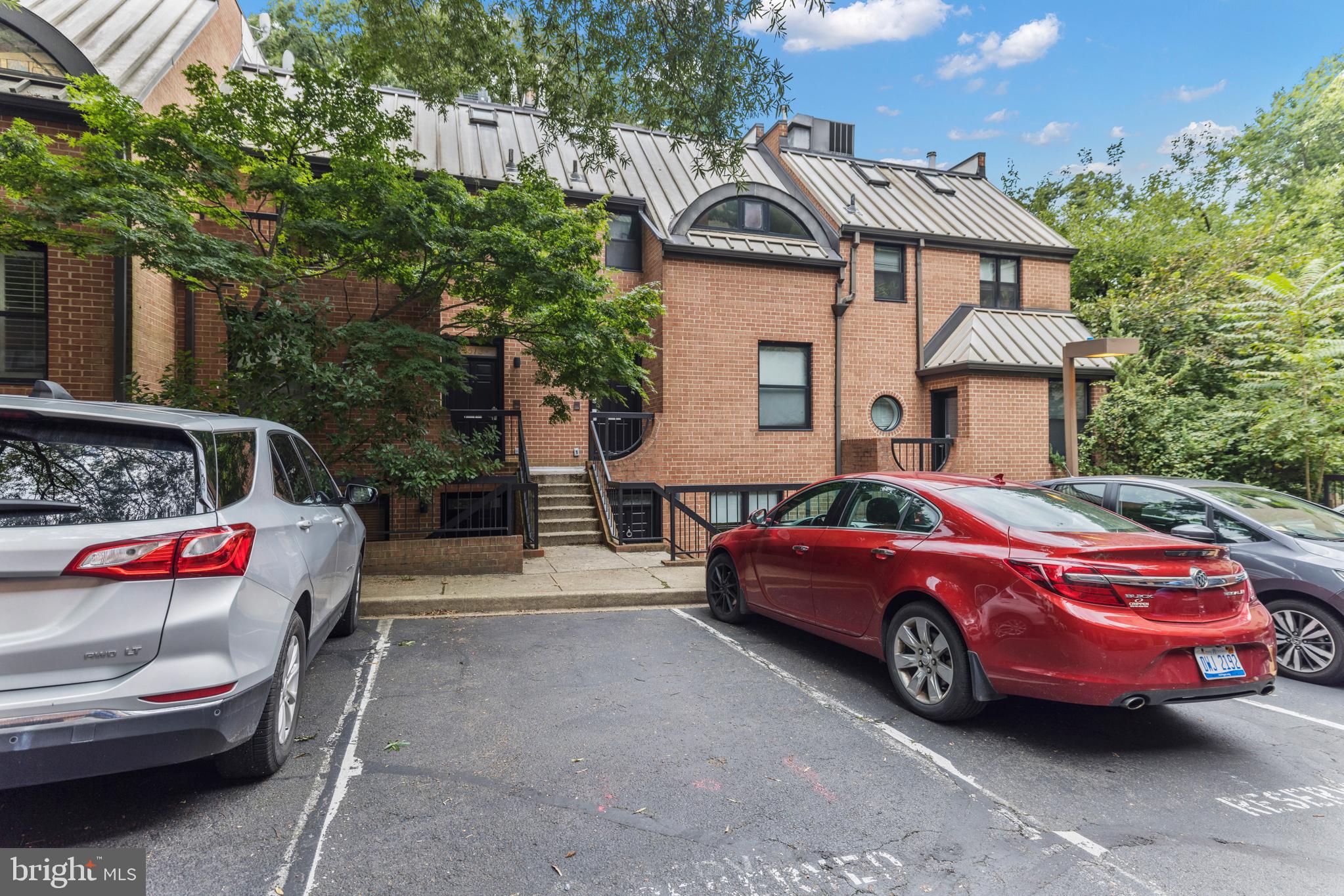 3517 17th Street Northwest, Unit 10 Washington, DC 20010 - Photo 35 of 35 a front view of a house with parking space