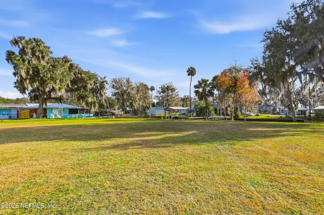 a view of swimming pool with trees