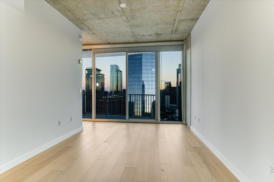 360 Nueces Street, Unit 3207 Austin, TX 78701 - Photo 13 of 30 wooden floor in an empty room