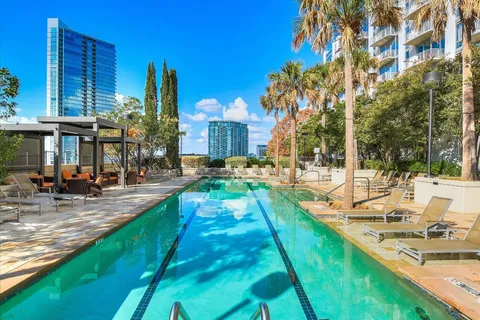 a view of a swimming pool with a patio