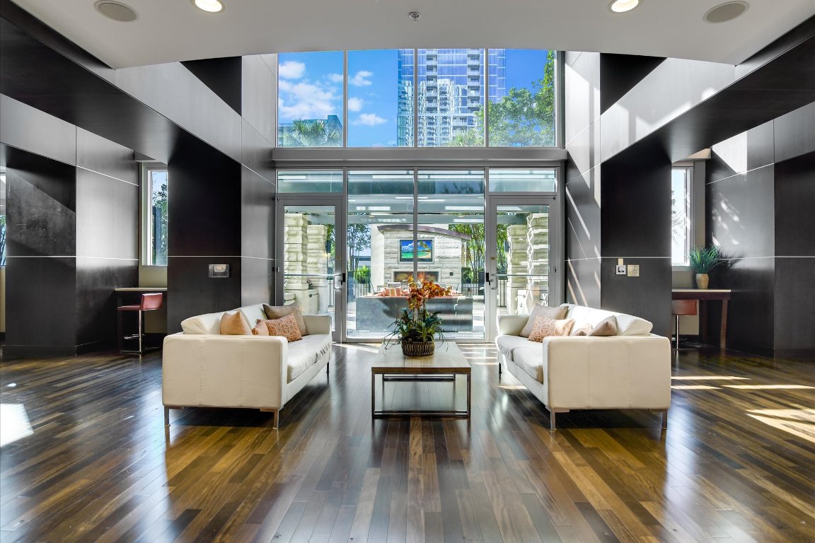 360 Nueces Street, Unit 3207 Austin, TX 78701 - Photo 27 of 30 a living room with furniture and a large window