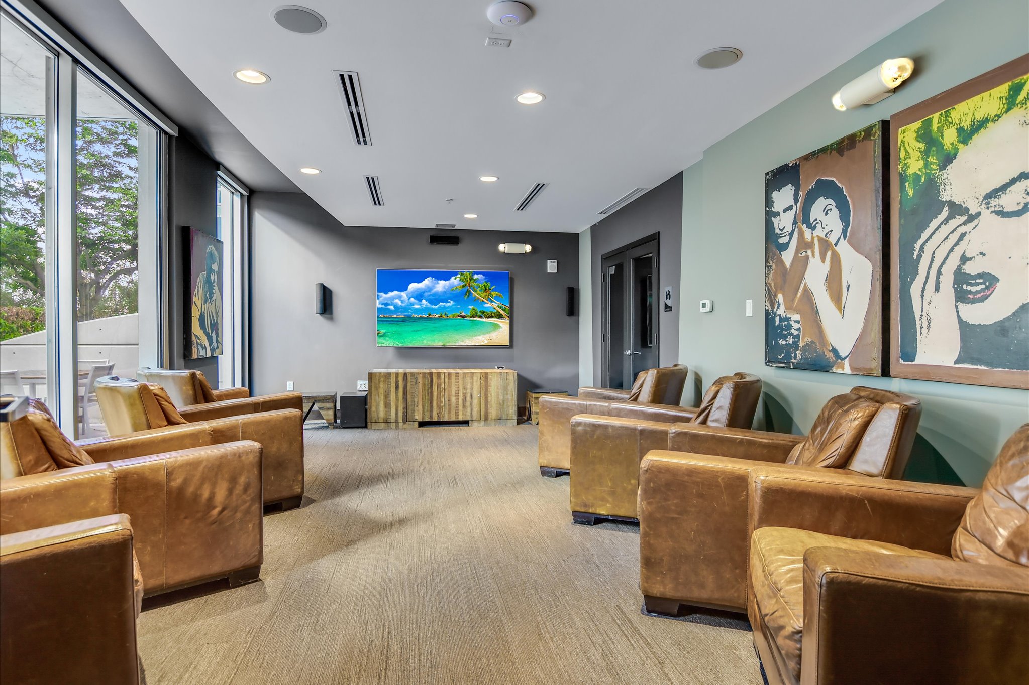 360 Nueces Street, Unit 3207 Austin, TX 78701 - Photo 28 of 30 a living room with furniture and a flat screen tv