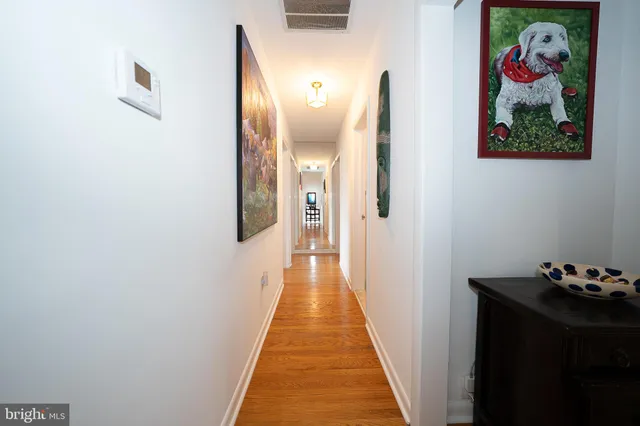 a view of a hallway with front door