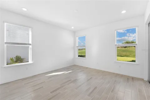 an empty room with windows