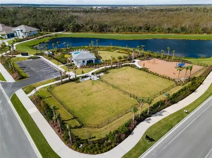a view of a swimming pool with a chairs