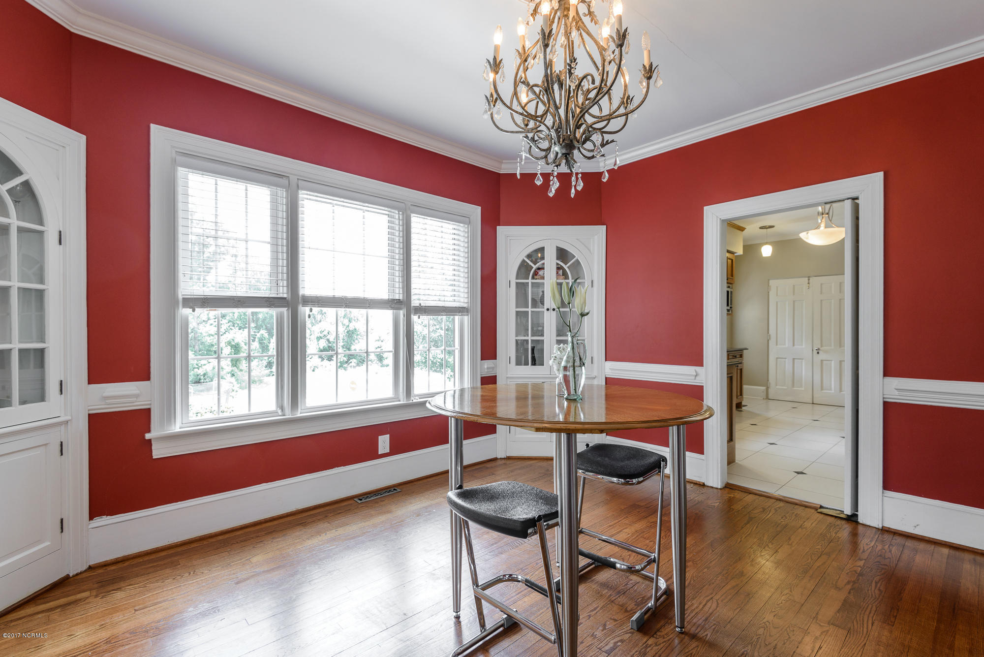 1100 West Rock Spring Road Greenville, NC 27858 - Photo 12 of 51 formal dining room with 2 built-in china cabinets