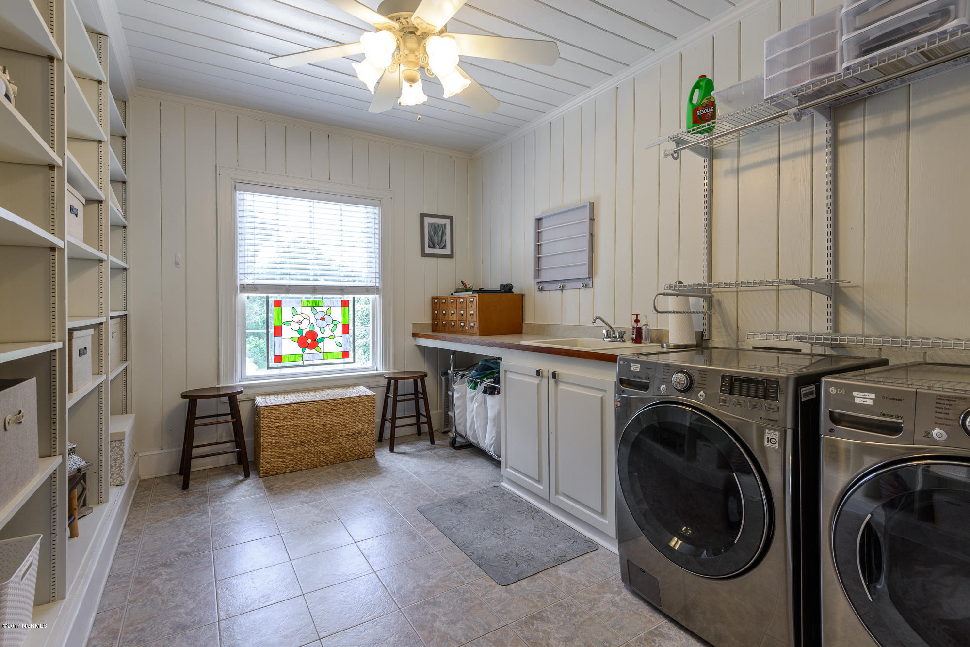 1100 West Rock Spring Road Greenville, NC 27858 - Photo 28 of 51 massive laundry room with sink and countertops