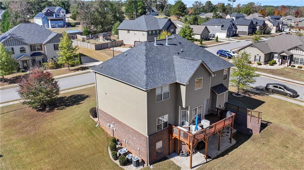190 Silver Ridge Road Covington, GA 30016 - Photo 2 of 51 an aerial view of multiple houses with yard