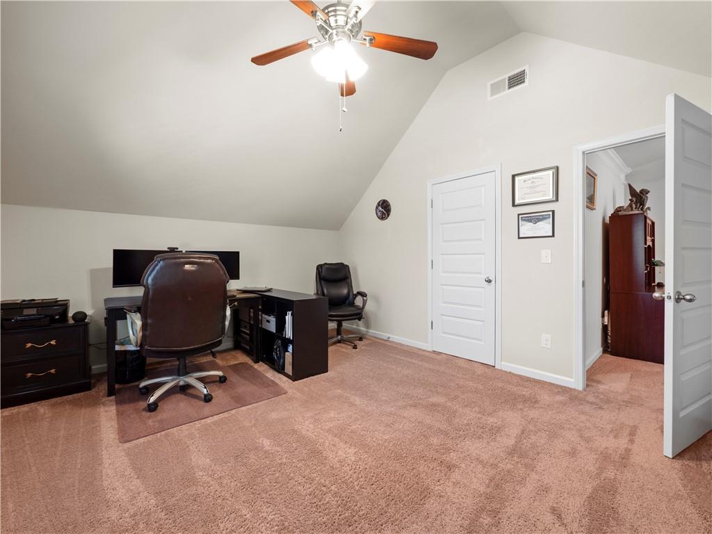 190 Silver Ridge Road Covington, GA 30016 - Photo 23 of 51 a view of workspace with windows