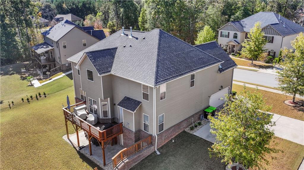 190 Silver Ridge Road Covington, GA 30016 - Photo 3 of 51 an aerial view of a house with large trees