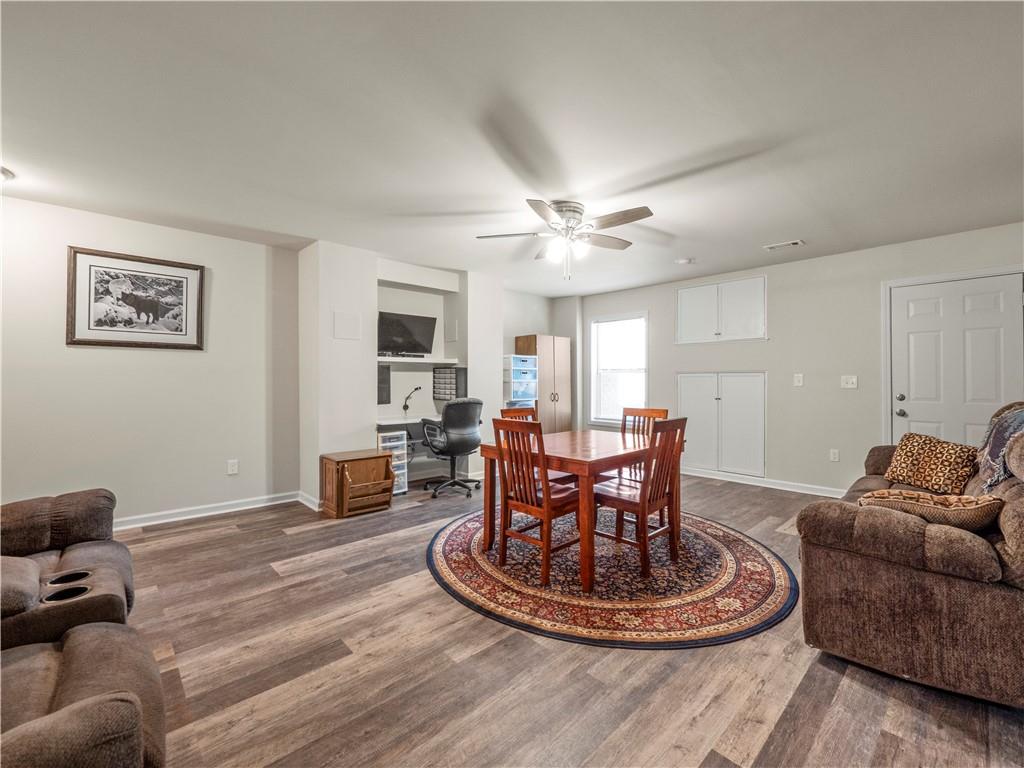 190 Silver Ridge Road Covington, GA 30016 - Photo 33 of 51 a living room with furniture and a fireplace