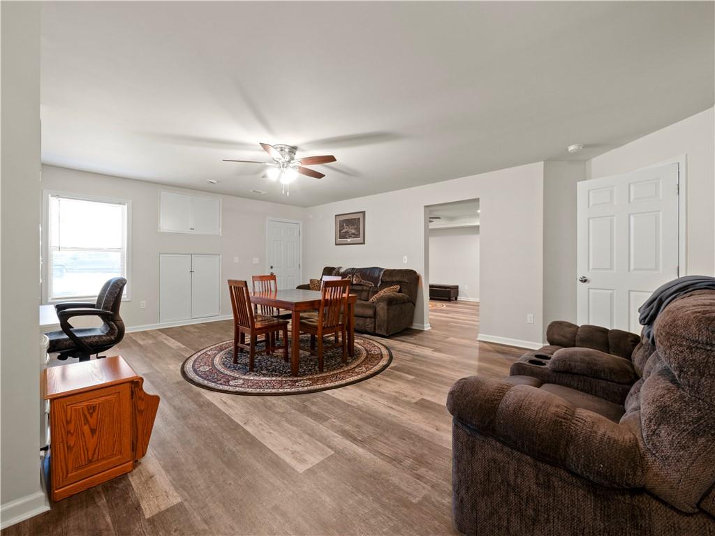 190 Silver Ridge Road Covington, GA 30016 - Photo 34 of 51 a living room with furniture a air conditioner and a window