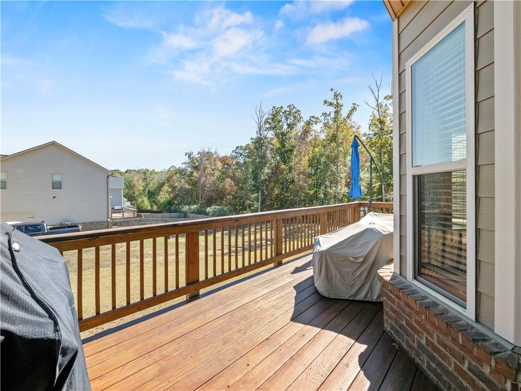 190 Silver Ridge Road Covington, GA 30016 - Photo 37 of 51 a view of balcony with wooden floor and outdoor seating
