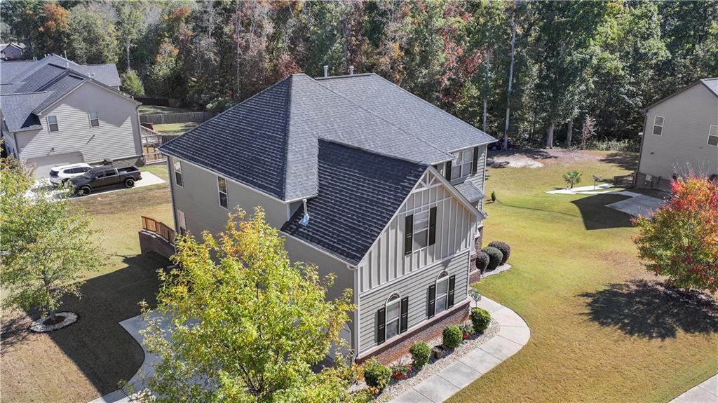 190 Silver Ridge Road Covington, GA 30016 - Photo 4 of 51 a aerial view of a house with a yard and balcony