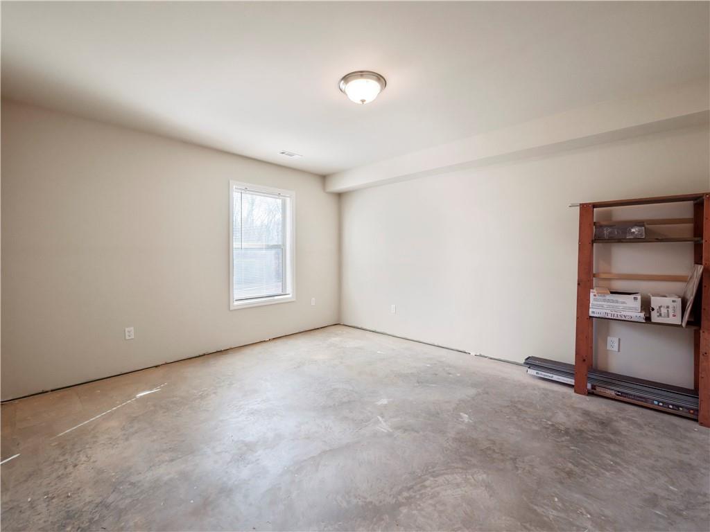 190 Silver Ridge Road Covington, GA 30016 - Photo 49 of 51 a view of an empty room with a window