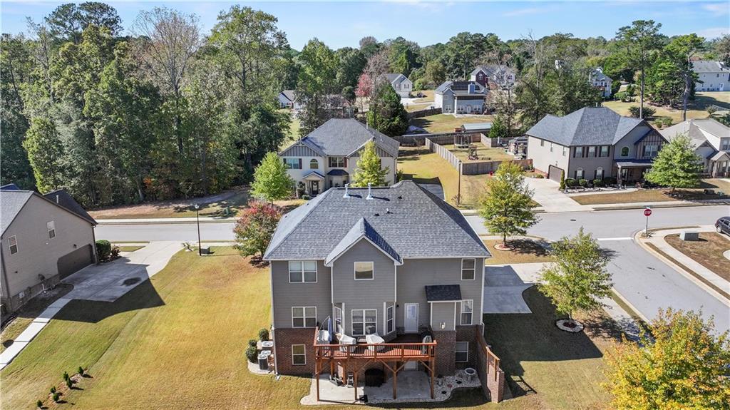 190 Silver Ridge Road Covington, GA 30016 - Photo 5 of 51 an aerial view of a house with swimming pool and sitting area