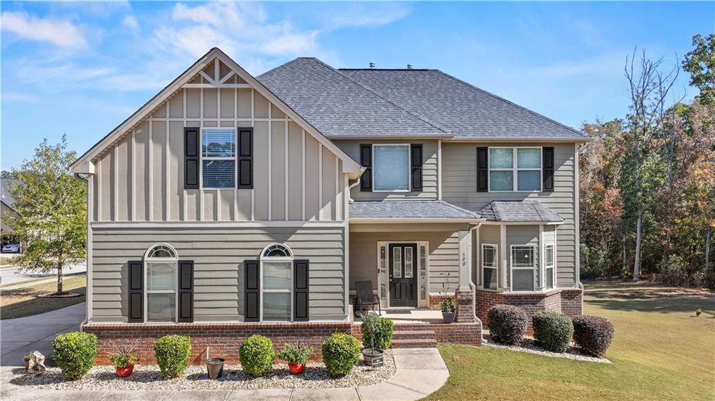 190 Silver Ridge Road Covington, GA 30016 - Photo 7 of 51 a front view of a house with a yard