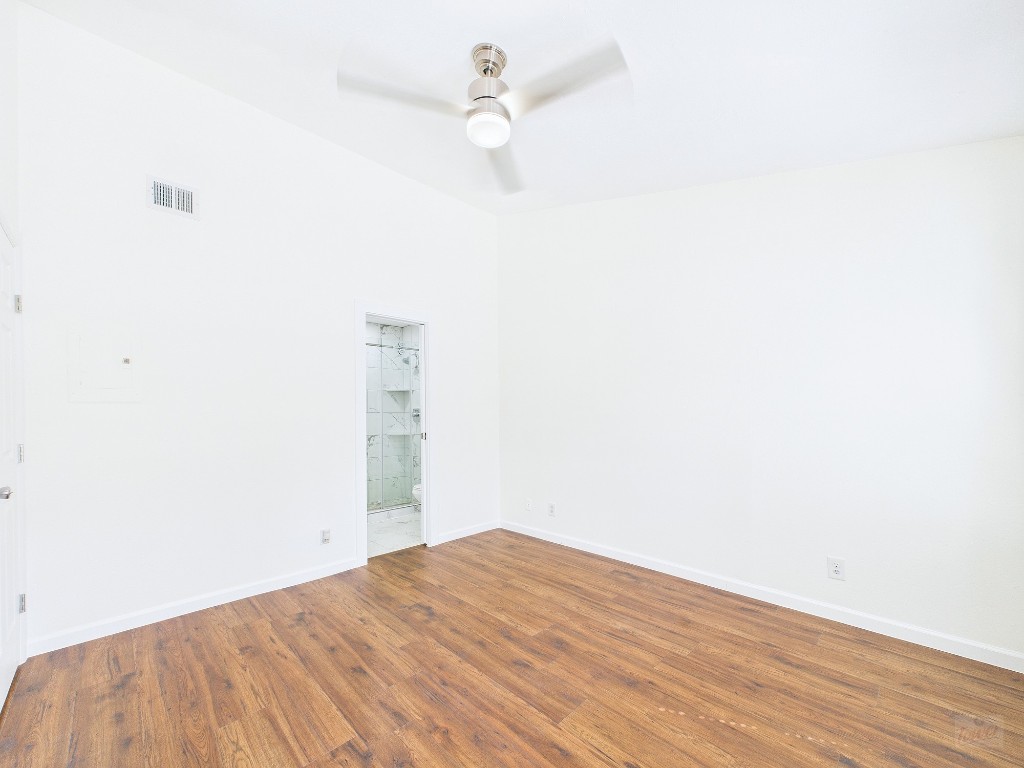 2216 San Gabriel Street, Unit 305 Austin, TX 78705 - Photo 24 of 38 a view of empty room with wooden floor