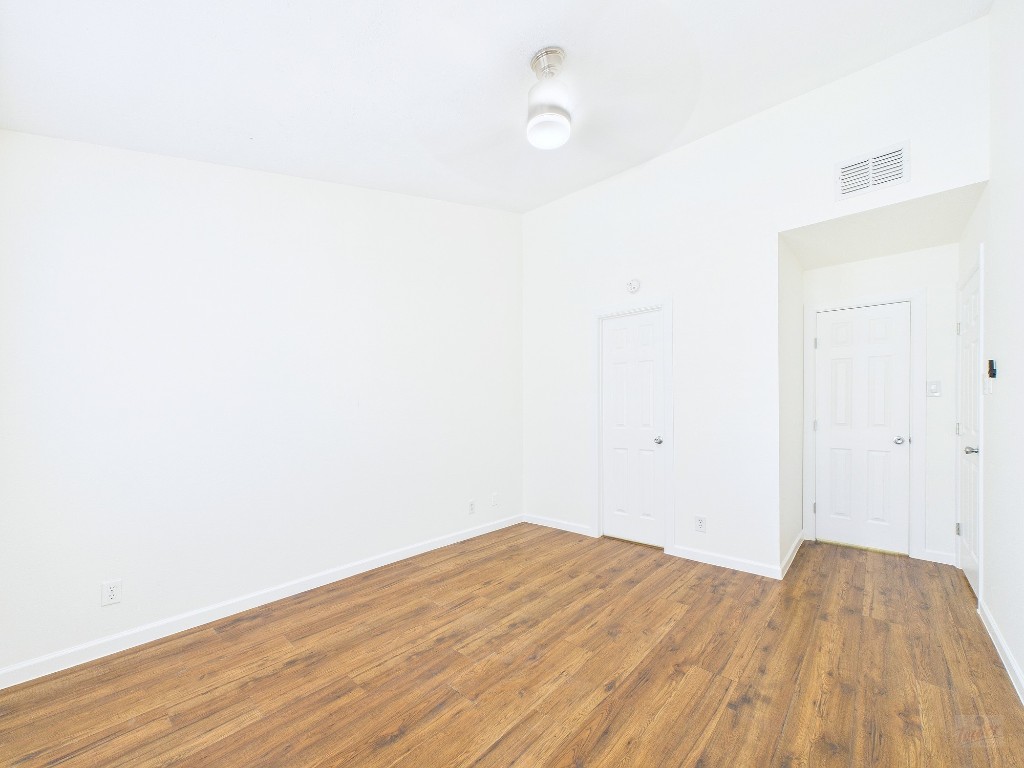 2216 San Gabriel Street, Unit 305 Austin, TX 78705 - Photo 27 of 38 a view of empty room with wooden floor