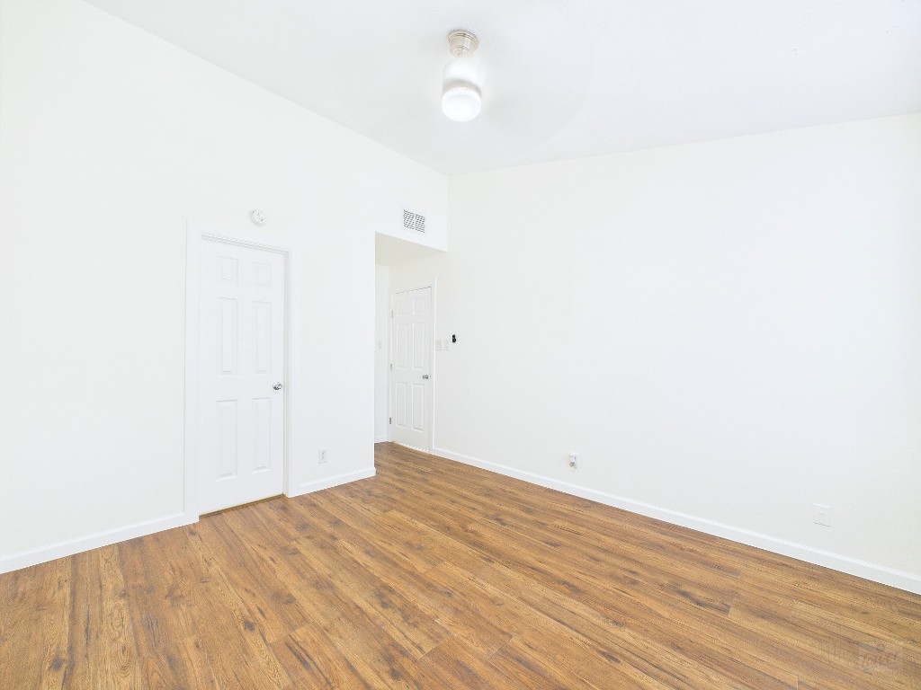 2216 San Gabriel Street, Unit 305 Austin, TX 78705 - Photo 29 of 38 a view of empty room with wooden floor