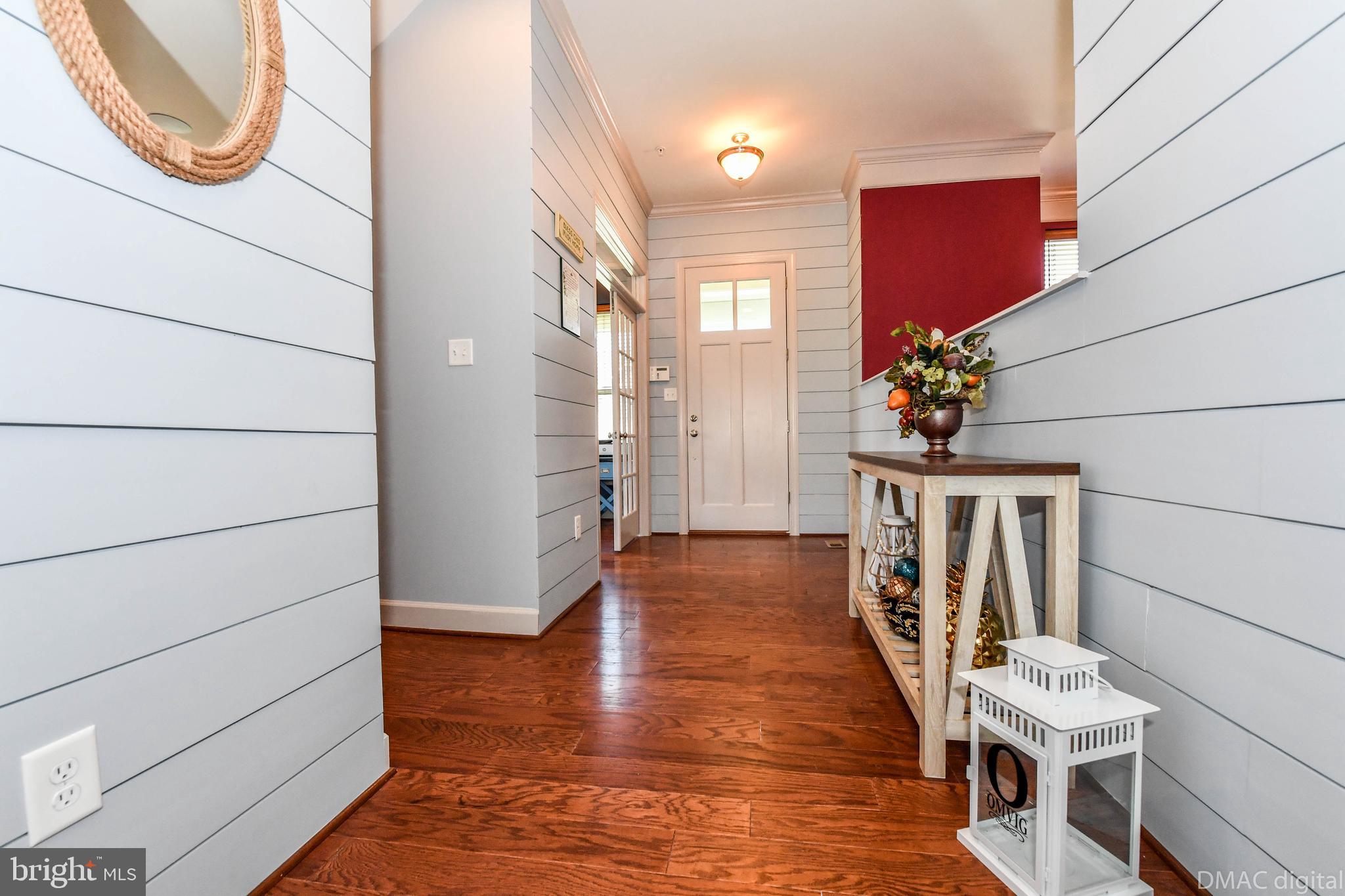 6860 East Shavano Road New Market, MD 21774 - Photo 6 of 45 Rustic foyer with ship lap walls