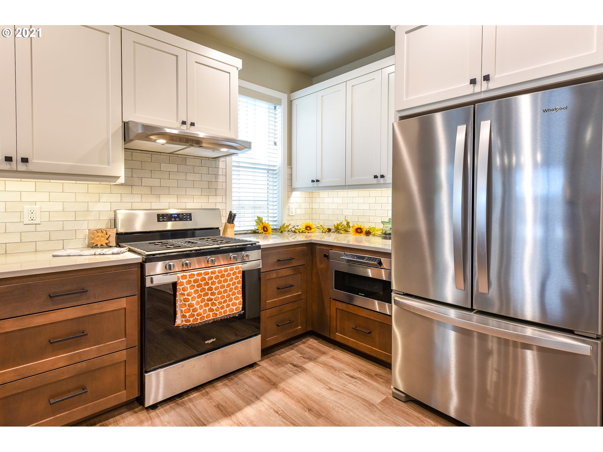 978 South 47th Street Springfield, OR 97478 - Photo 10 of 32 a kitchen with stainless steel appliances a refrigerator sink and cabinets