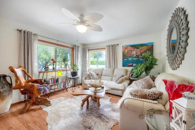 a kitchen with stainless steel appliances granite countertop a lot of counter space and wooden floor