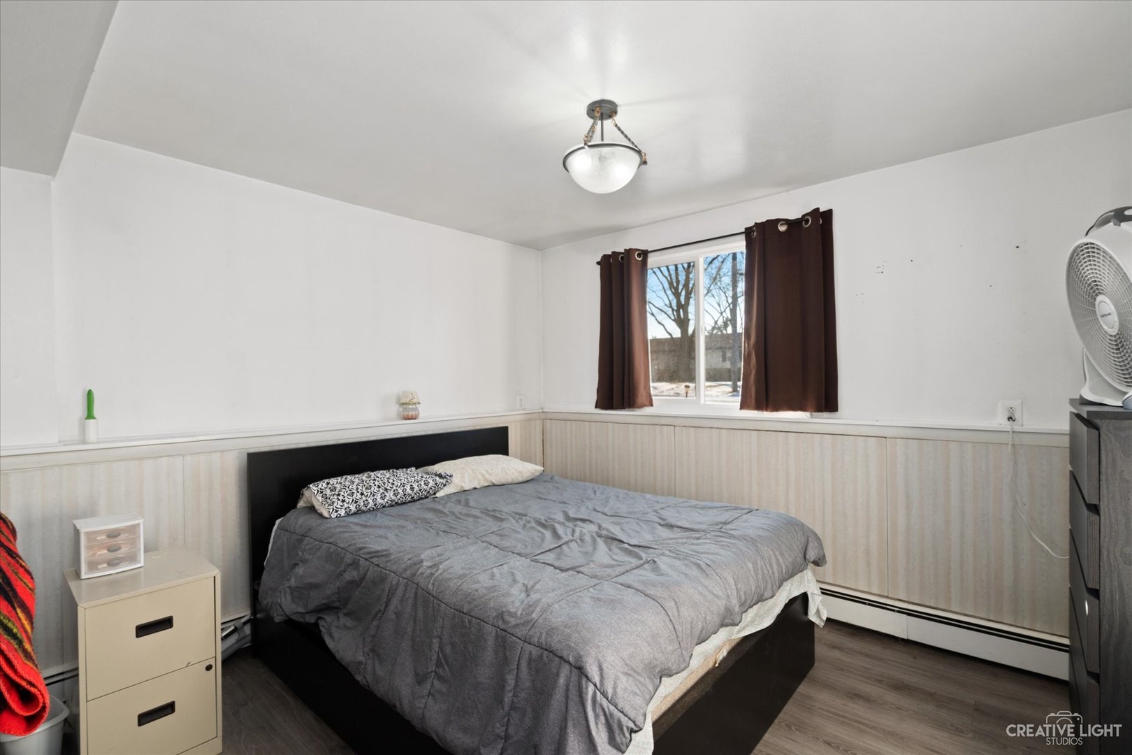 232 Reid Road Genoa, IL 60135 - Photo 15 of 25 a bedroom with a bed and a window