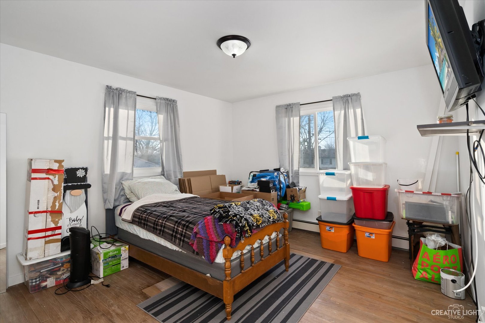 232 Reid Road Genoa, IL 60135 - Photo 19 of 25 a bedroom with bed and a window