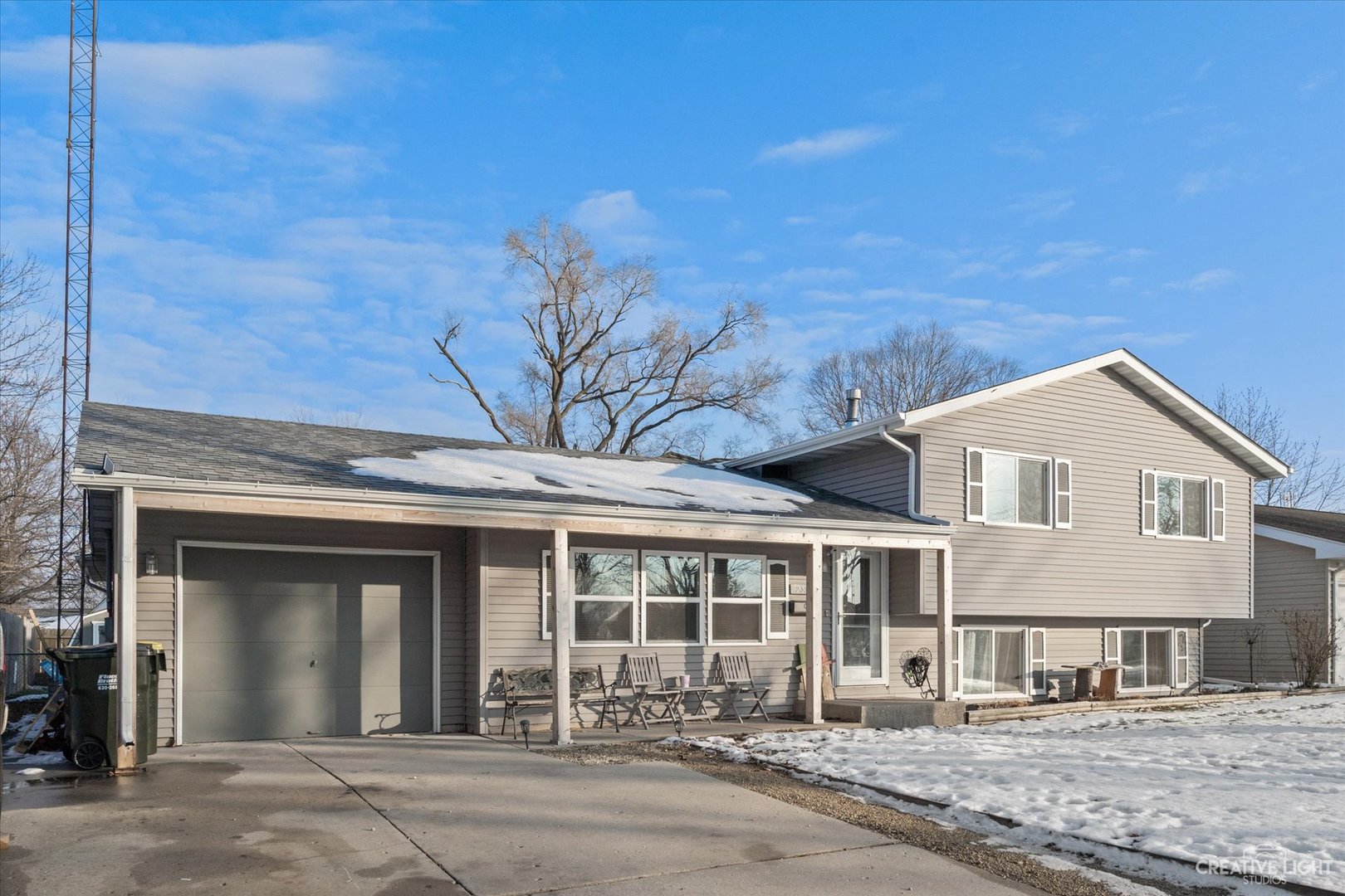 232 Reid Road Genoa, IL 60135 - Photo 2 of 25 a front view of a house with a garden
