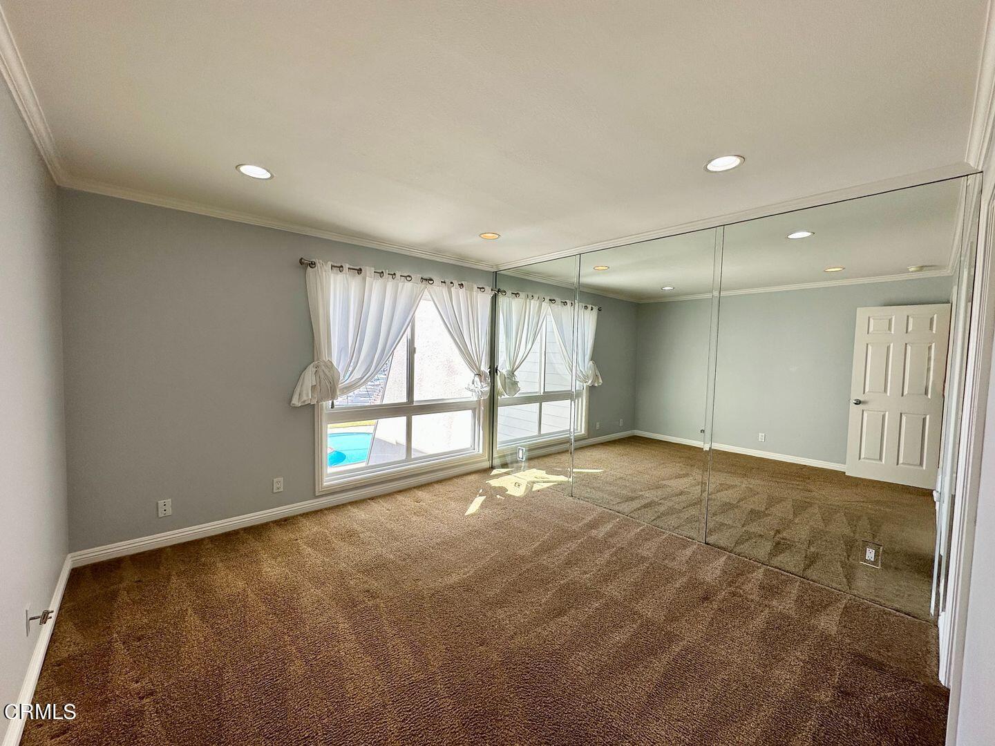 2901 Peninsula Road, Unit 348 Oxnard, CA 93035 - Photo 12 of 22 a view of an empty room with a window
