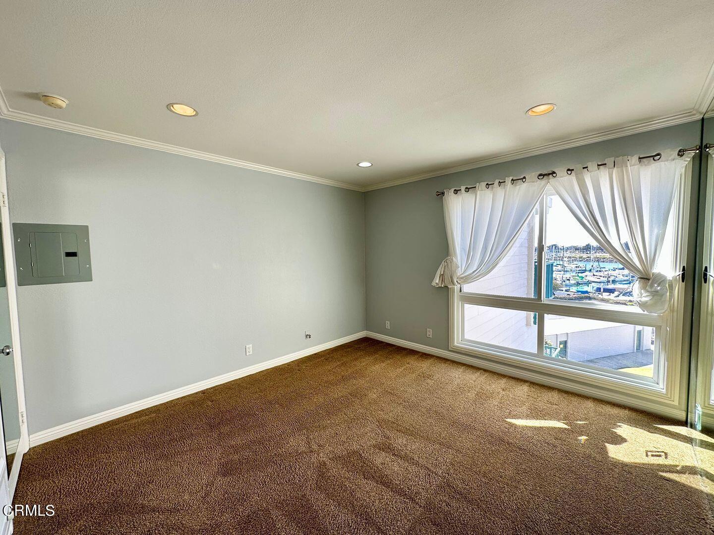 2901 Peninsula Road, Unit 348 Oxnard, CA 93035 - Photo 15 of 22 an empty room with windows