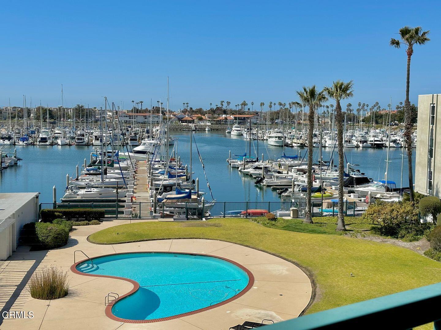 2901 Peninsula Road, Unit 348 Oxnard, CA 93035 - Photo 17 of 22 a view of a swimming pool with outdoor seating