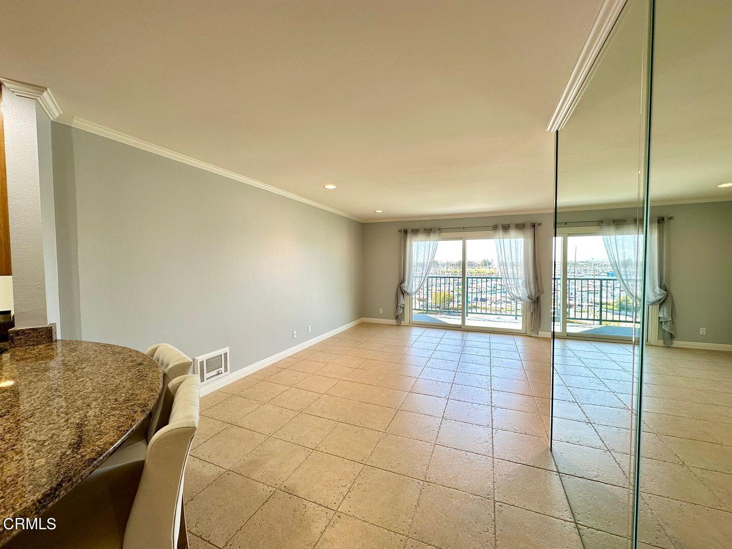 2901 Peninsula Road, Unit 348 Oxnard, CA 93035 - Photo 6 of 22 a view of an empty room and window