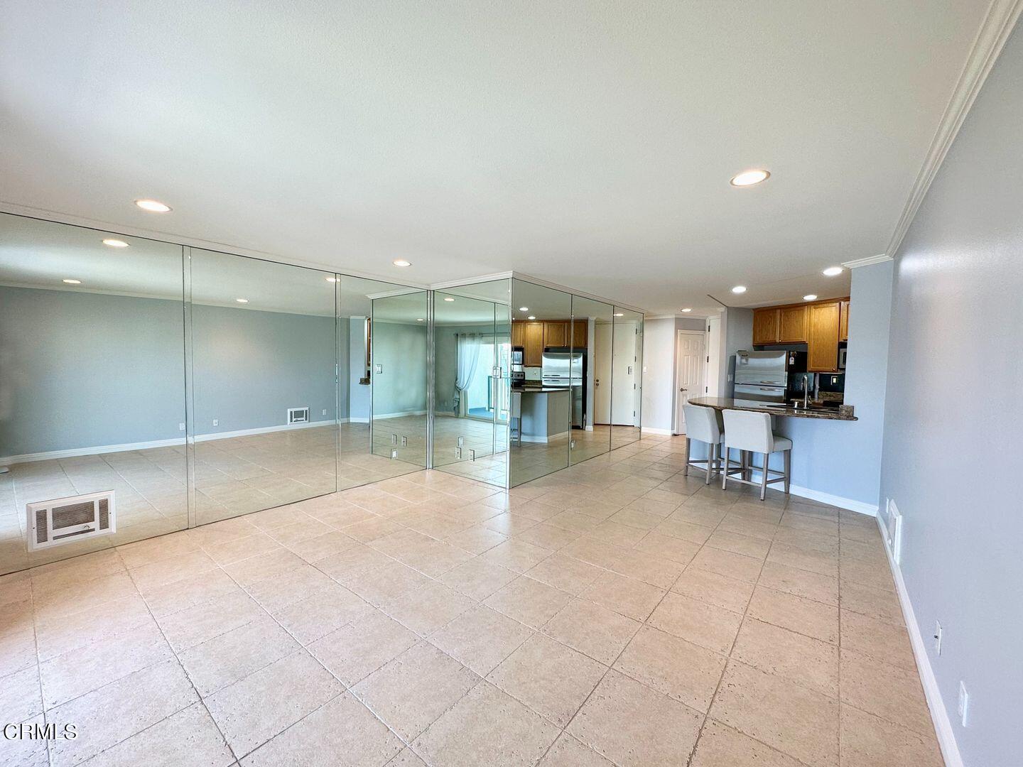 2901 Peninsula Road, Unit 348 Oxnard, CA 93035 - Photo 7 of 22 a view of kitchen with furniture and a refrigerator