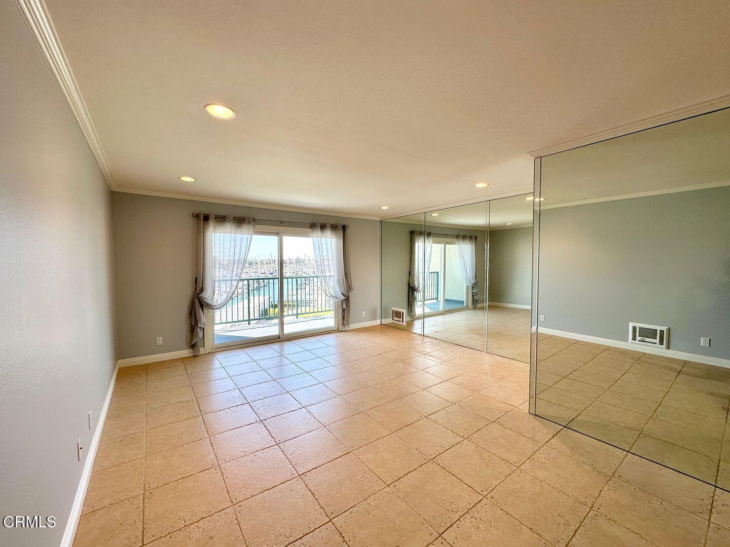 2901 Peninsula Road, Unit 348 Oxnard, CA 93035 - Photo 8 of 22 a view of an empty room with a window