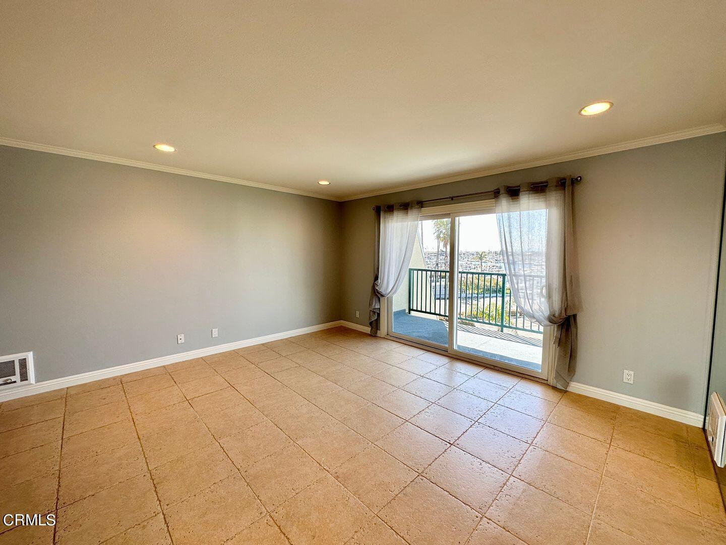2901 Peninsula Road, Unit 348 Oxnard, CA 93035 - Photo 9 of 22 a view of an empty room with a window