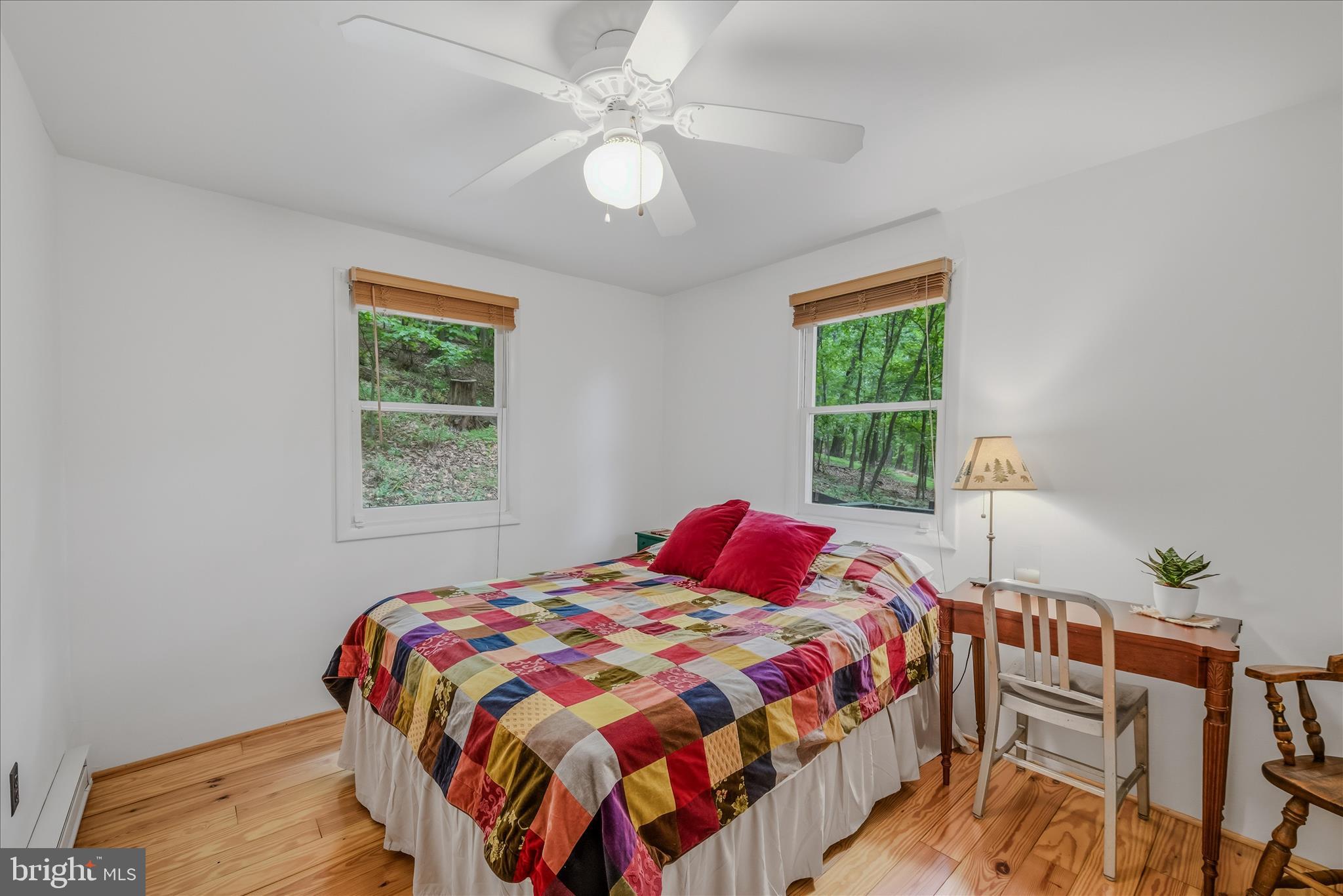 98 Ore Trail Berkeley Springs, WV 25411 - Photo 21 of 46 a bedroom with a bed and a window