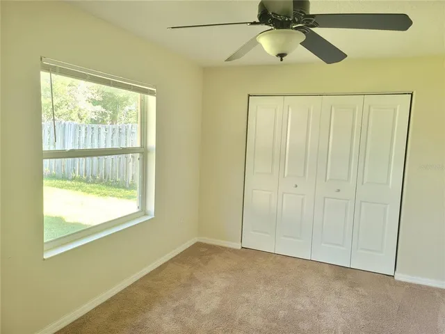 a room with furniture and a window