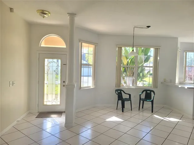 a view of a livingroom with furniture and window
