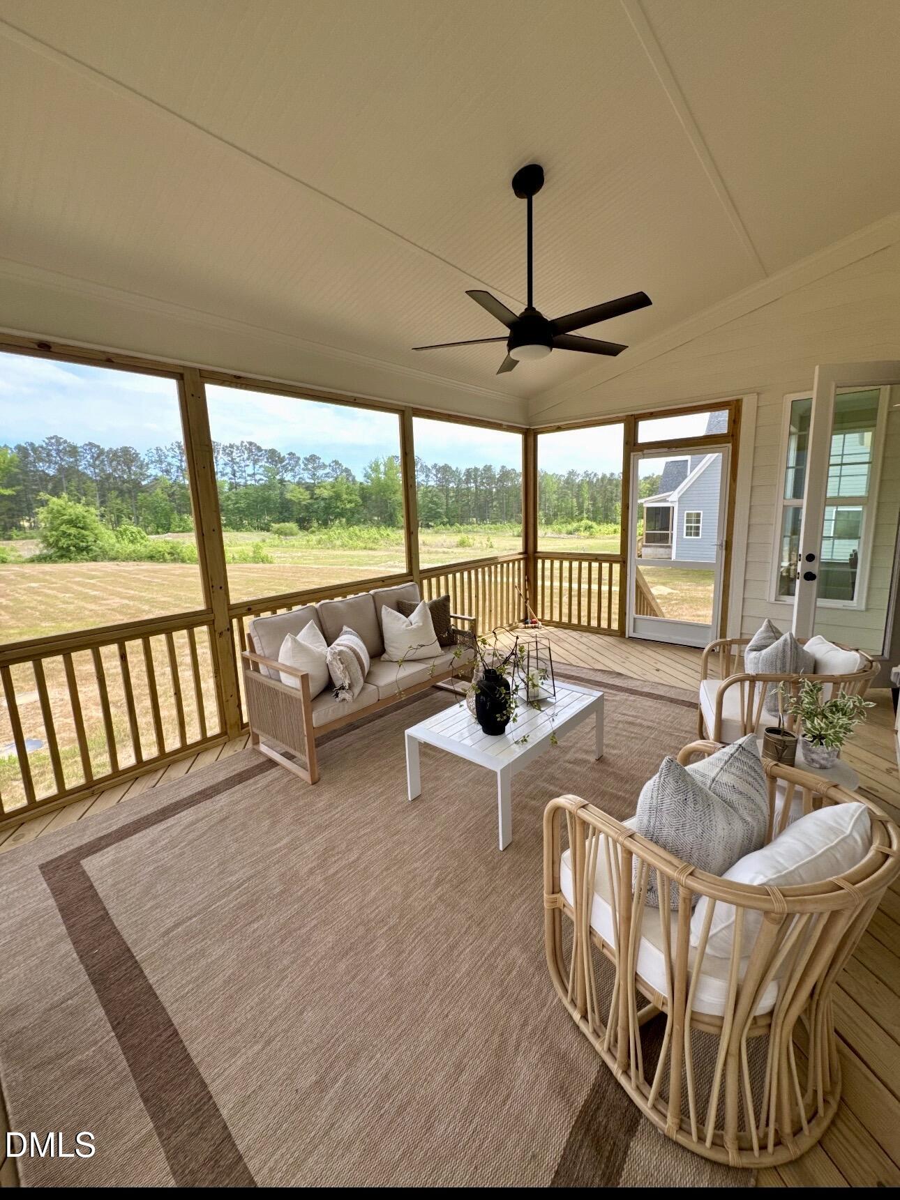1057 Azalea Garden Circle Raleigh, NC 27603 - Photo 19 of 20 a living room with furniture and a floor to ceiling window