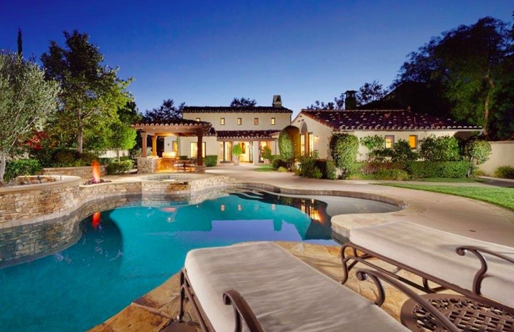 30 Praire Grass Irvine, CA 92603 - Photo 1 of 1 a view of a swimming pool with a patio