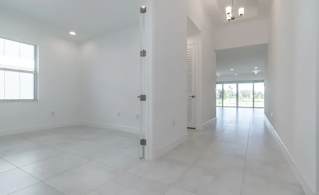 a view of an empty room with a balcony