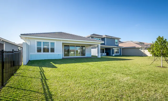a view of a house with a swimming pool