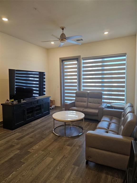 2700 Old Denton Road, Unit 3325 Carrollton, TX 75007 - Photo 2 of 6 Spacious living area featuring wood-finish flooring, recessed lighting, and a ceiling fan