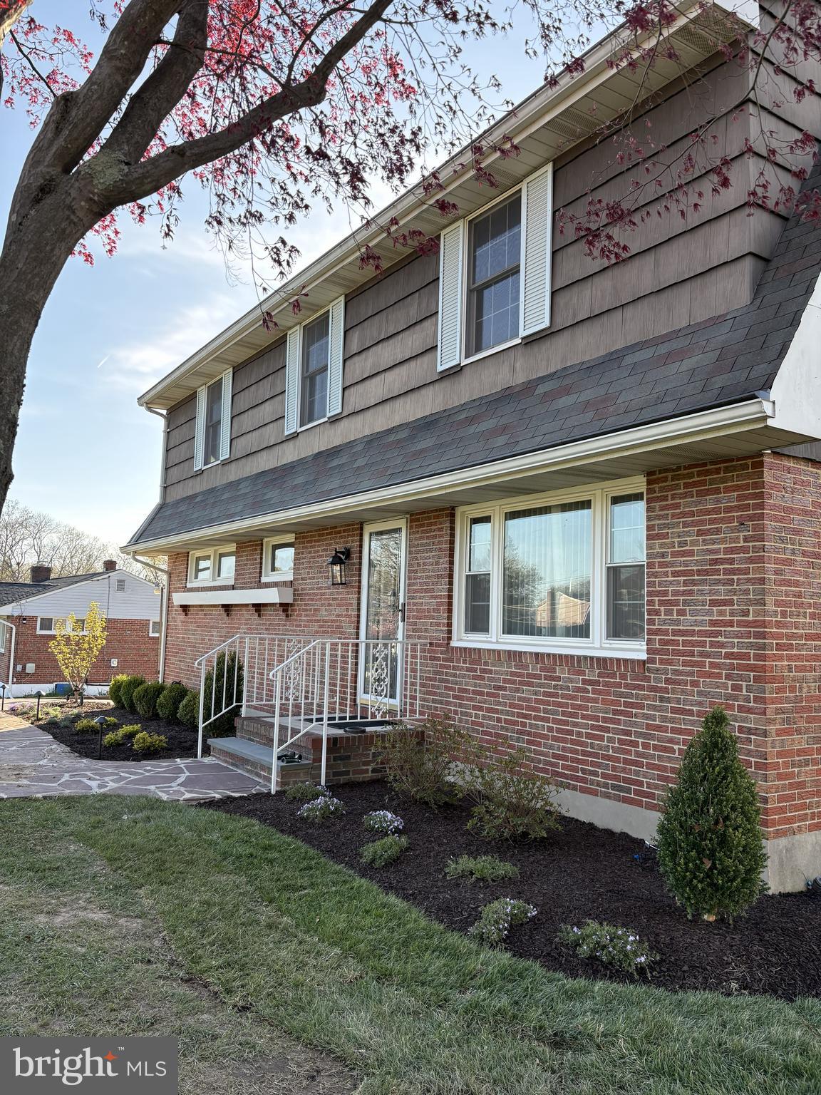 9204 Snyder Lane Perry Hall, MD 21128 - Photo 33 of 42 a front view of a house with a yard